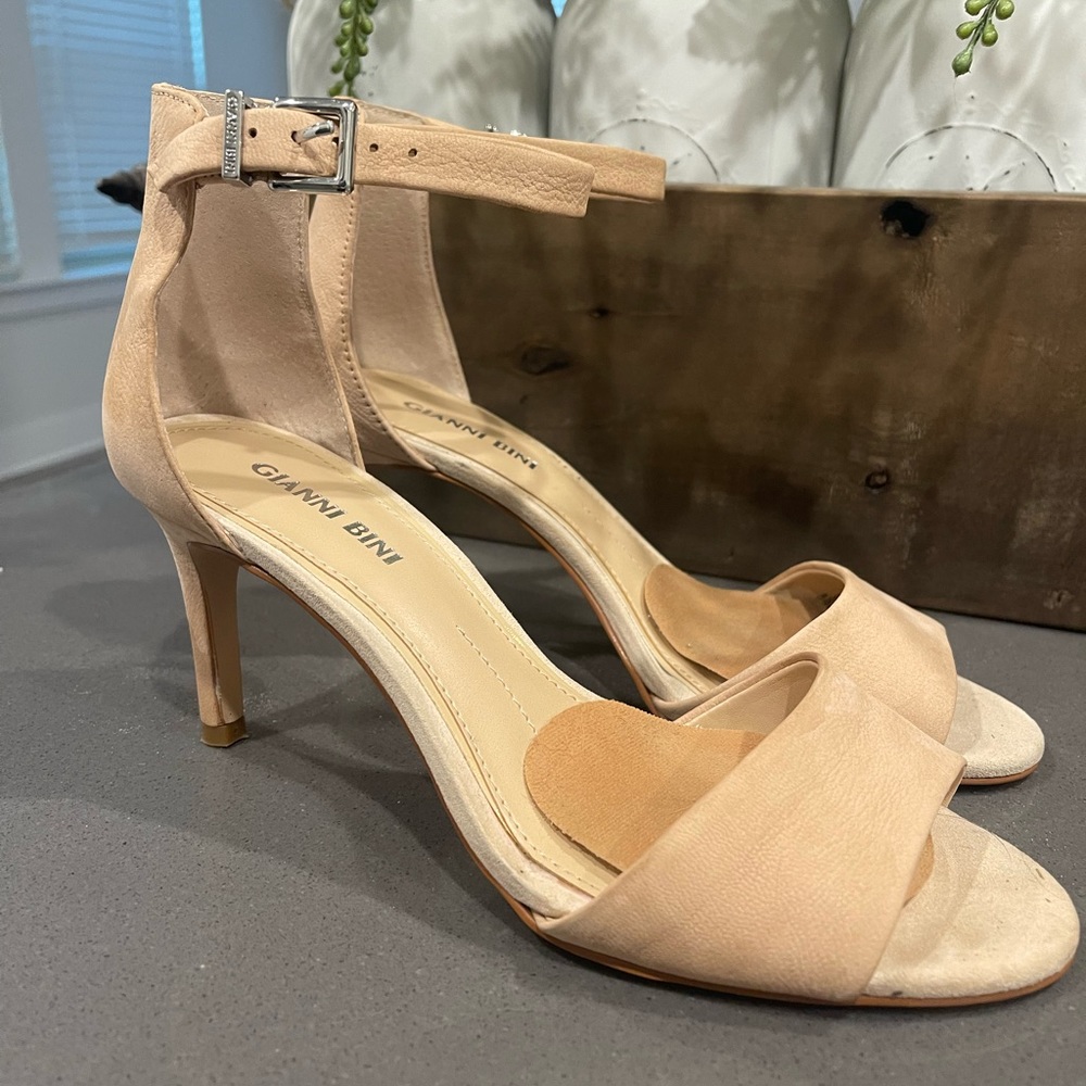Worn one time nude sandals.